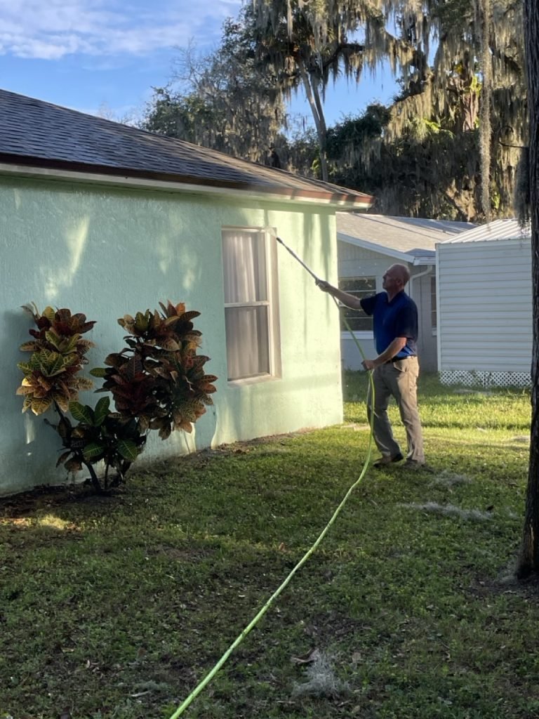 Lift Off soft washing a home in Volusia County